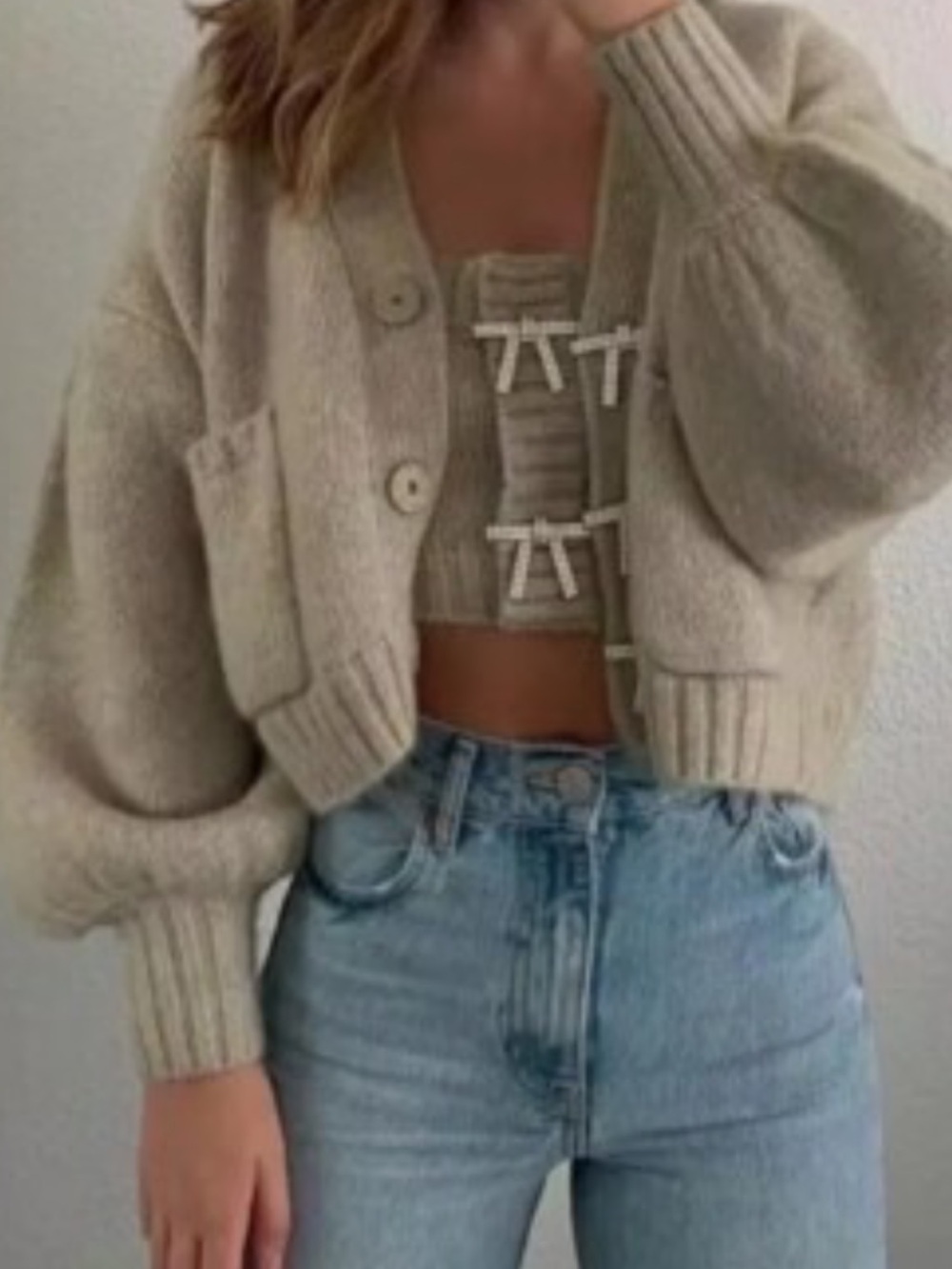 Bow button fuzzy knit balloon sleeve cardigan